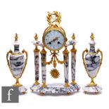 A 20th Century French gilt metal and marble clock garniture, eight day striking movement on pillared