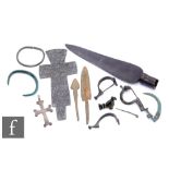 Various Bronze age to Roman items to include two German bracelets, two arrow heads, two fibulas, a