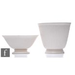 A mid to late 20th Century Wedgwood jardiniere glazed in moonstone white with vertical fluting,