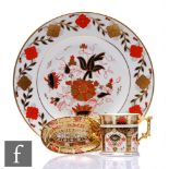 Two pieces of Royal Crown Derby comprising an Imari 8687 pattern plate, diameter 26.5cm and a twin