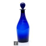 An early 19th Century Bristol Blue I. Jacobs decanter, circa 1800, of club form with gilt decoration
