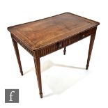 A late 18th Century mahogany silver table, the rectangular top with dished rim over a lunette carved