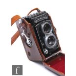 A Rollieflex Franke & Heidecke 120 film camera, synchro-compur shutter No 2186848, in leather case.