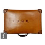 A stitched leather gentleman's travelling case monogrammed A.H.R fitted with five silver topped