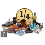 A collection of ink bottles, a horn beaker, desk seals, brass ware and assorted items including