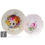 Two Royal Worcester cabinet plates, the first decorated by W. Austin with a hand painted rose