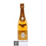 A 750ml bottle of 1994 Louis Roederer Cristal champagne, lacking cellophane but with original box.