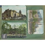 An Edwardian postcard album comprising real photographic views, scenic views, comical, greetings and