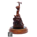 A hollow cast spelter figure in a bronzed finish, 'Self-made Man', by