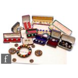 A collection of assorted 19th Century and later buttons and dress studs to include gilt metal