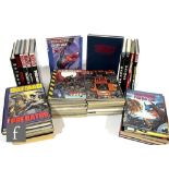 A collection of Marvel and DC books and graphic novels, all relating to Batman, Superman and