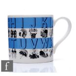 A Wedgwood mug decorated in the Alphabet pattern designed by Eric Ravilious, produced for Towner Art