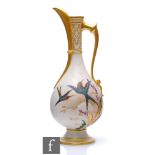 A large late 19th Century Royal Worcester shape 779 Aesthetic pedestal ewer decorated with two