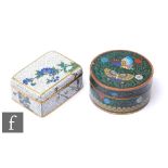 A small late 19th to early 20th Century Chinese cloisonné box of rounded rectangular form, decorated