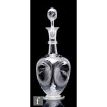 A late 19th Century clear crystal decanter attributed to John Walsh Walsh, of ovoid footed form with