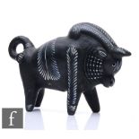 A mid 20th Century continental (probably Spanish) model of a bull in black clay with white painted