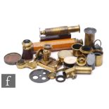 A small brass single drawer telescope, a leather cased monocular telescope and various microscope