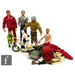 A collection of assorted action figures to include Denys Fisher Six Million Dollar Man, Maskatron,