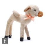 A Chad Valley lamb, circa 1930s, white mohair, red Hygienic Toys label, height 25cm, well loved.