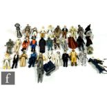 A collection of Kenner Star Wars 3 3/4 inch action figures, with a selection of weapons and