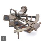 An early 20th Century brass sextant by Henry Barrow & Co London, and a wooden associated case