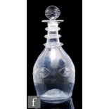 An early 19th Century clear crystal Waterloo decanter, circa 1810, of ovoid form body decorated with