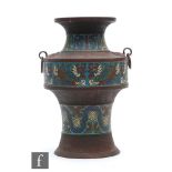 A Chinese early 20th Century Archaic style vase, the spreading circular base rising to a waisted