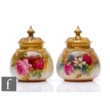 Two Royal Worcester shape H175 covered vases, both decorated with hand painted floral sprays, one