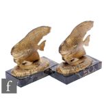 A pair of French Art Deco gilded spelter bookends, circa 1930, modelled as stylised angelfish,