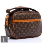 A Louis Vuitton Reporter PM cross body bag dated 1997, monogrammed leather with gilt hardware and