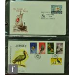 A collection of Queen Elizabeth II postage stamp presentation packs and first day covers,