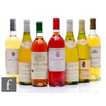 A collection of French, Italian and Spanish white and rose wine, including 1985 Calvet Sauternes,