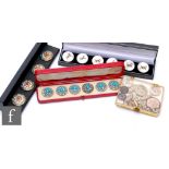 A collection of assorted 19th Century and later buttons to include a cased set of six stamped 'Welsh