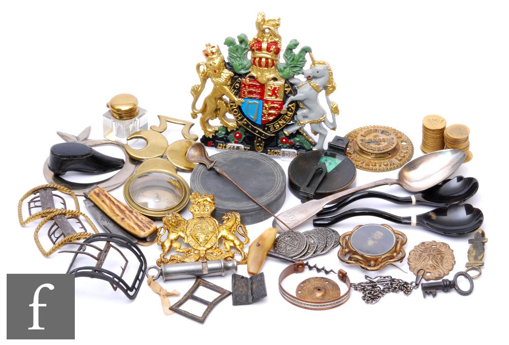 A collection of gilt brass George III spade guinea brass gaming counters, also Georgian steel