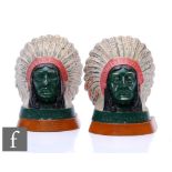 Two Guys Motors Ltd Indian head painted mascots, each on wooden plinth bases, height 14cm. (2)