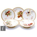 A late 19th Century Royal Worcester part dessert service each decorated with a hand painted garden
