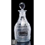 A later 18th Century Anglo Irish clear crystal decanter, circa 1795, of prussian form with bands