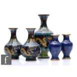 A collection of Chinese cloisonne vases, to include a pair of bottle vases and another baluster