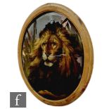 A late 19th Century painted study of a male lion with full mane amongst grasses, on an oval mirror