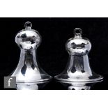 A graduated pair of mid 19th Century smoke domes of thistle form with upper applied loop and and a