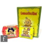 A collection of Topps Garbage Pail Kids items, comprising assorted 1985 stickers, a complete set