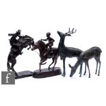 A bronze cowboy and rearing horse, after Remington, also a jockey and rider and a bronzed stag and