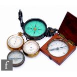 A 19th century circular brass pocket barometer F H Steward London, No 2058, another unnamed, a