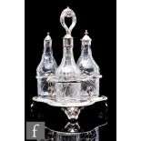 A late Georgian condiment bottle set circa 1800, comprising three bottle shape clear crystal glass