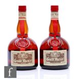 Two bottles of 70cl Grand Marnier Liqueur, both boxed.