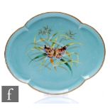 A late 19th Century quatre lobed shaped tray decorated with a butterfly amidst grasses, all to a