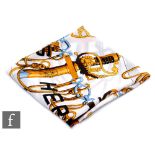 A Hermes Cliquetis silk scarf decorated with sword hilts and pommels, no box, 89cm x 85cm.
