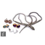 A small parcel lot of assorted earrings to include 9ct amethyst and faux opal earrings, a silver and