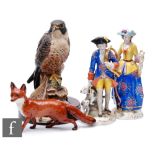 A collection of ceramics, to include a Royal Doulton Peregrine Falcon figure HN 3541, on wooden