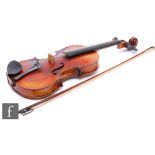 A late 19th Century German violin bears label L.Lowendall Dresden, length 36cm, with bow and case,